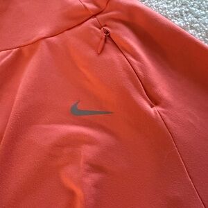 Nike Coral-Orange Running Hoodie with Branded Inner Trim